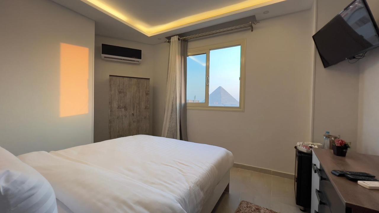 Pyramids Tower View Inn Nazlat as Sammān Exteriör bild