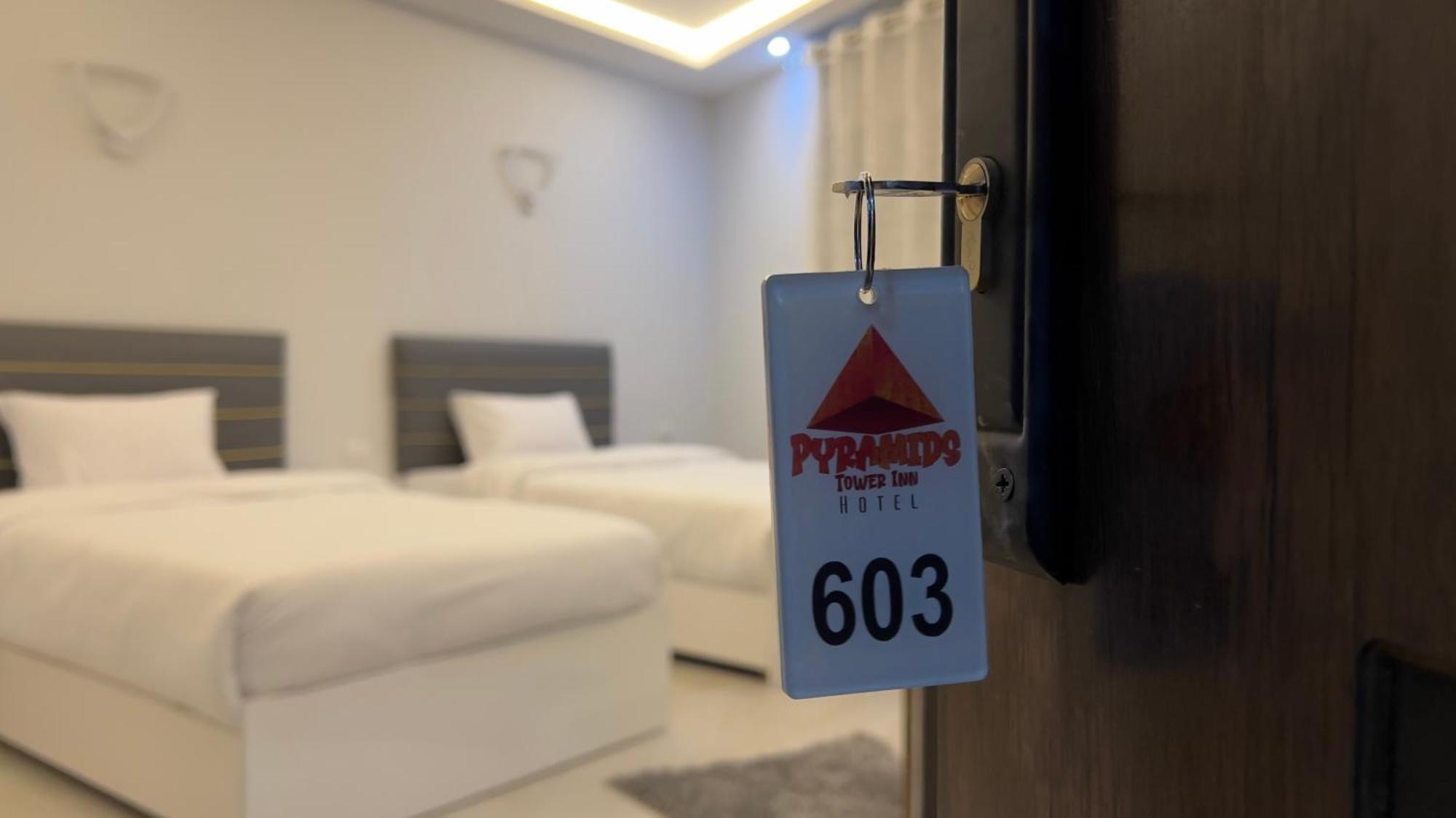 Pyramids Tower View Inn Nazlat as Sammān Exteriör bild